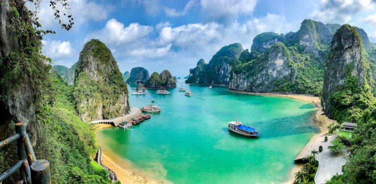 a group of boats floating on top of a body of water